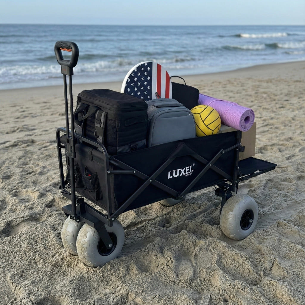 Luxel beach cart with beach gear on a sandy beach with ocean in the background